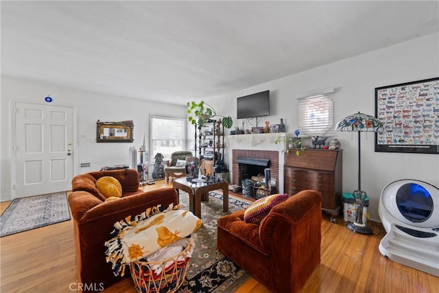 1801 N Ross St, Santa Ana, CA 92706 - living room featuring plenty of natural light, wood finished floors, and a fireplace