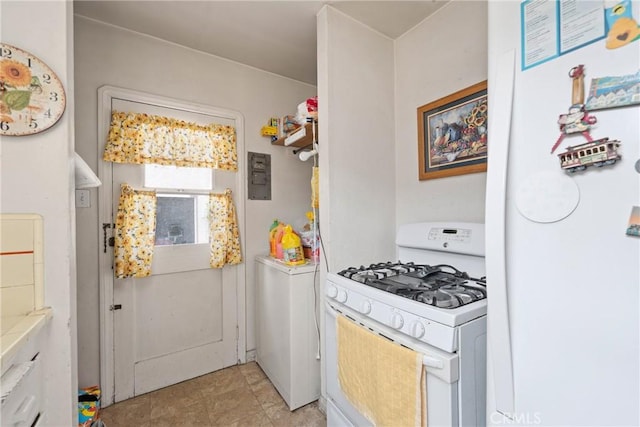 1801 N Ross St, Santa Ana, CA 92706 - kitchen with white appliances, washer / clothes dryer, and light countertops