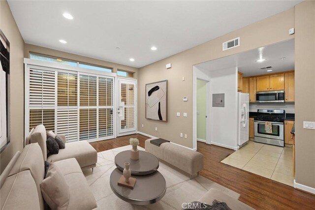 53 N Oak Ave Unit 5, Pasadena, CA 91107 - living area featuring light wood finished floors and recessed lighting