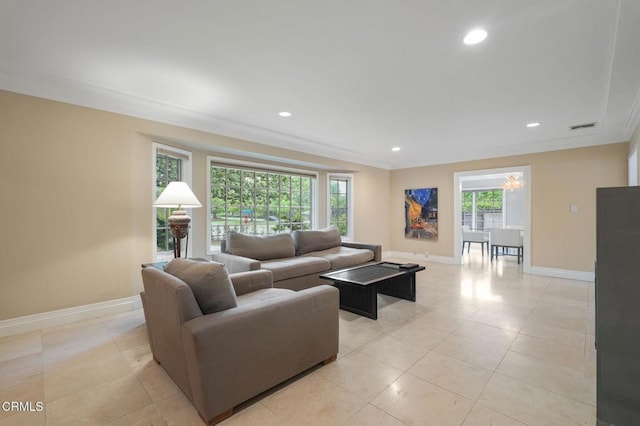 living room with crown molding, baseboards, light tile patterned floors, recessed lighting, and a chandelier