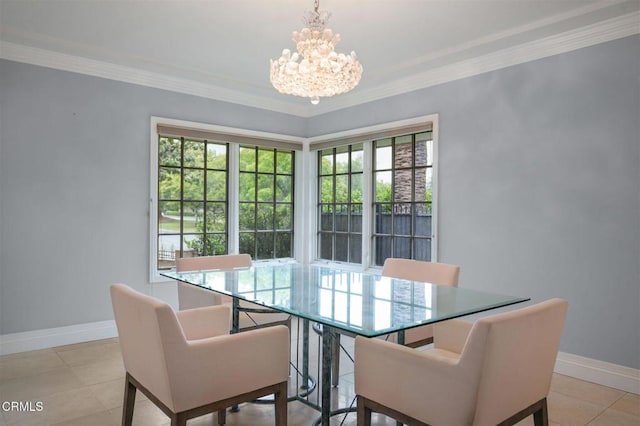 dining area featuring a chandelier, baseboards, ornamental molding, and light tile patterned floors