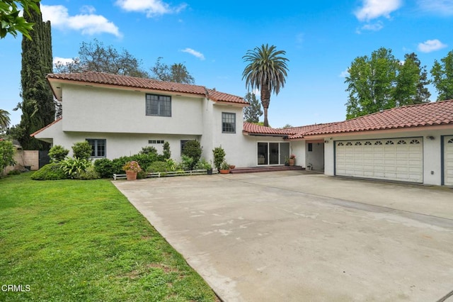 mediterranean / spanish-style house featuring a garage, stucco siding, driveway, and a tile roof