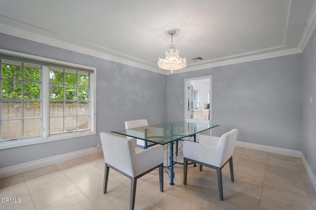 dining room featuring a chandelier, baseboards, ornamental molding, and light tile patterned flooring