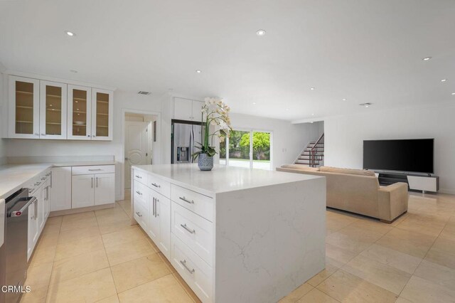 1525 Waverly Rd, San Marino, CA 91108 - kitchen featuring appliances with stainless steel finishes, white cabinetry, light tile patterned floors, glass insert cabinets, and recessed lighting