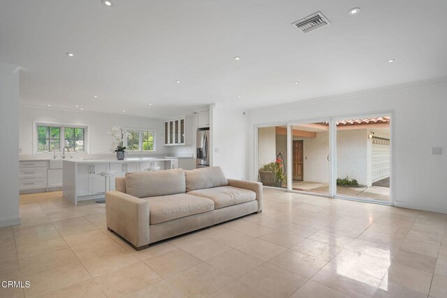 1525 Waverly Rd, San Marino, CA 91108 - living room with crown molding, light tile patterned floors, and recessed lighting