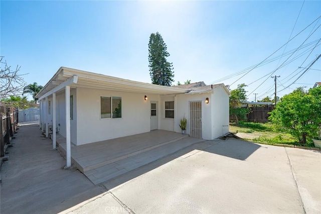 2613 Millbrae Ave, Duarte, CA 91010 - ranch-style home featuring stucco siding, a patio area, and a fenced backyard