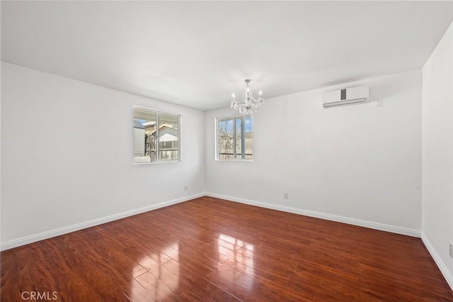 2613 Millbrae Ave, Duarte, CA 91010 - unfurnished room featuring a chandelier, wood finished floors, baseboards, and a wall unit AC