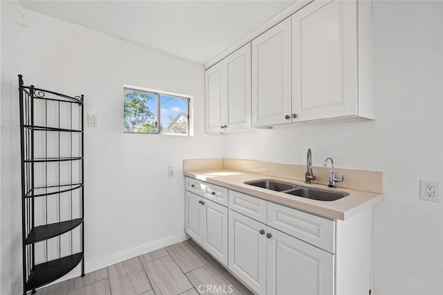 2613 Millbrae Ave, Duarte, CA 91010 - laundry area with a sink and baseboards
