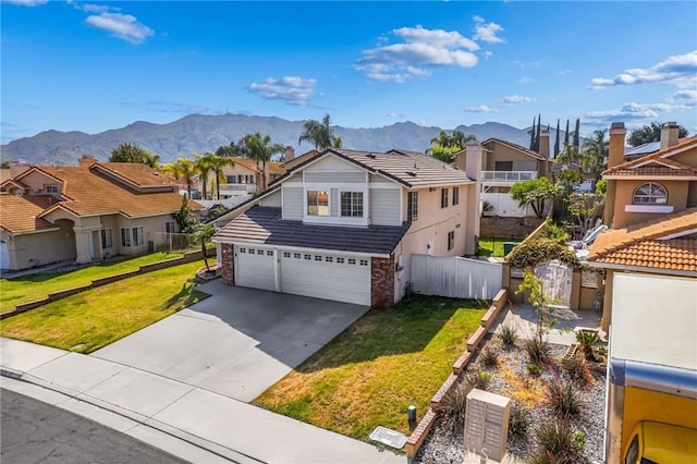 10059 Rock Hl, Moreno Valley, CA 92557 - traditional-style house featuring a residential view, a mountain view, and concrete driveway