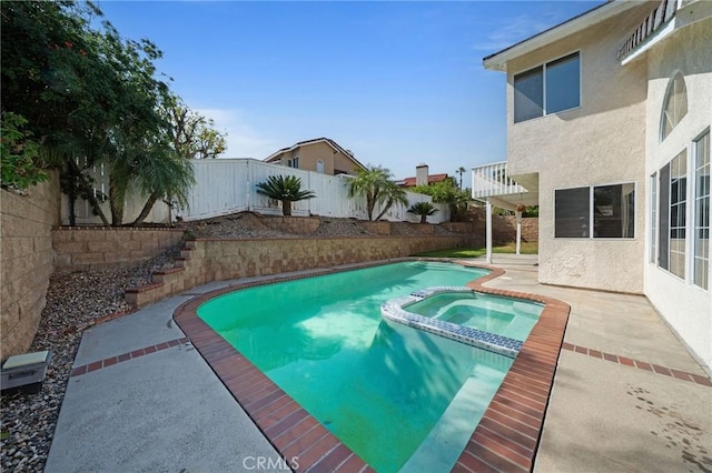 10059 Rock Hl, Moreno Valley, CA 92557 - view of swimming pool featuring a pool with connected hot tub, a fenced backyard, and a patio area