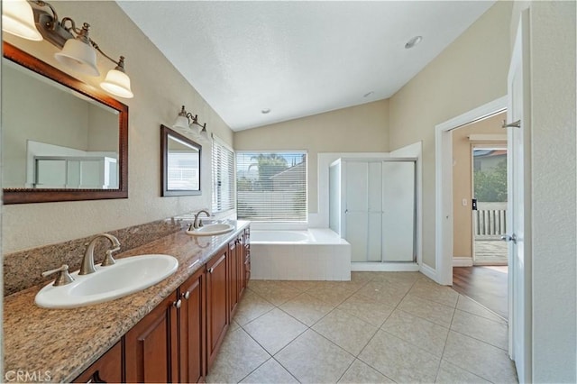 10059 Rock Hl, Moreno Valley, CA 92557 - full bathroom with lofted ceiling, plenty of natural light, a bath, a shower stall, and double vanity