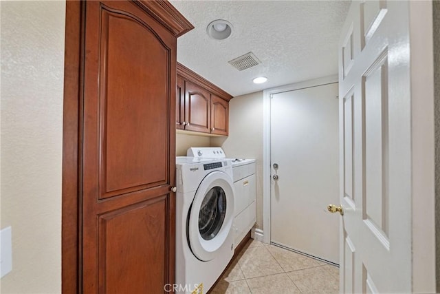 10059 Rock Hl, Moreno Valley, CA 92557 - washroom with washer and dryer, cabinet space, light tile patterned floors, a textured ceiling, and recessed lighting