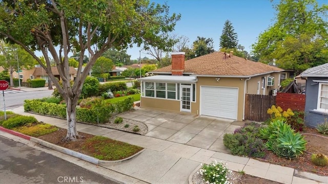1471 E Villa St, Pasadena, CA 91106 - view of front of house featuring stucco siding, a chimney, fence, driveway, and an attached garage