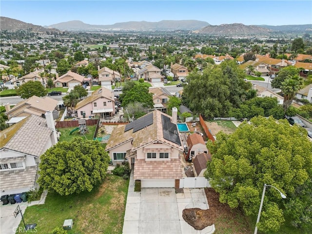4176 Canyonside Cir, Jurupa Valley, CA 92509 - aerial perspective of suburban area featuring a mountainous background