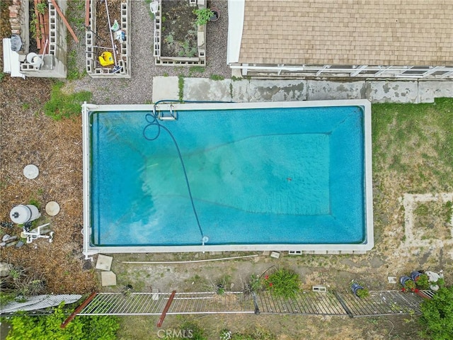 4176 Canyonside Cir, Jurupa Valley, CA 92509 - drone / aerial view of a pool