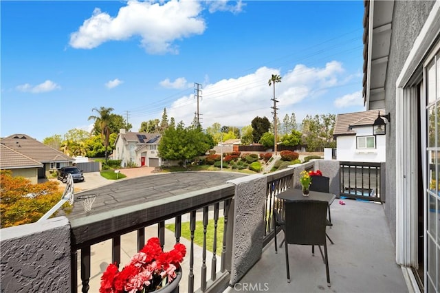 balcony featuring a residential view