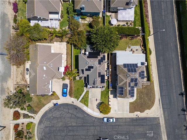 aerial view of property's location with nearby suburban area
