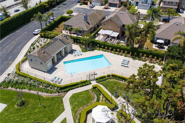 aerial view of residential area with a pool
