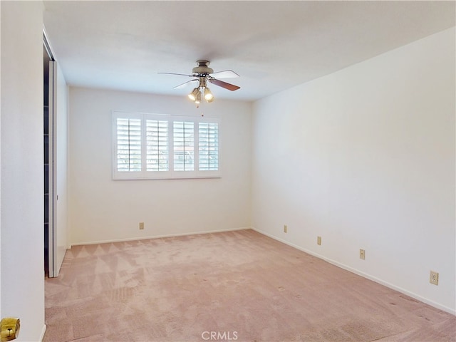 10531 Angel Ave, Fountain Valley, CA 92708 - unfurnished bedroom with light colored carpet, baseboards, and ceiling fan