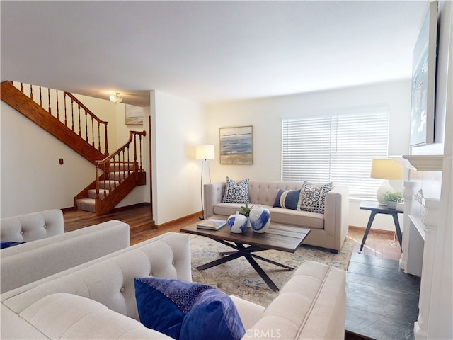 10531 Angel Ave, Fountain Valley, CA 92708 - living room with wood finished floors, stairway, and baseboards