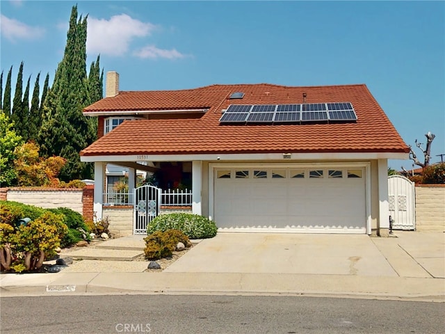 10531 Angel Ave, Fountain Valley, CA 92708 - view of front of house with a gate, a tile roof, and stucco siding