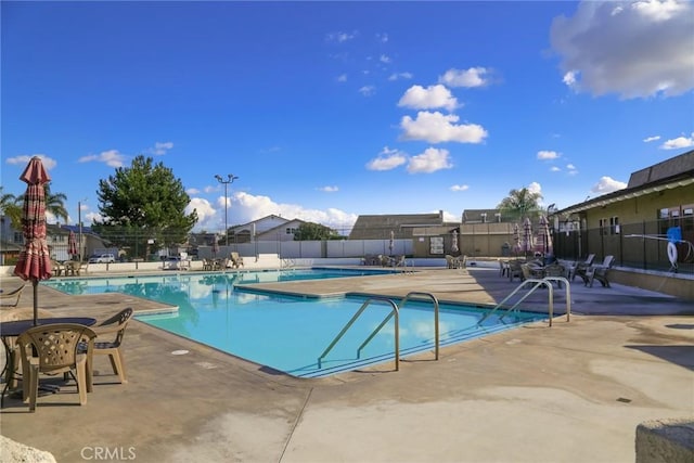 10531 Angel Ave, Fountain Valley, CA 92708 - community pool with fence and a patio area