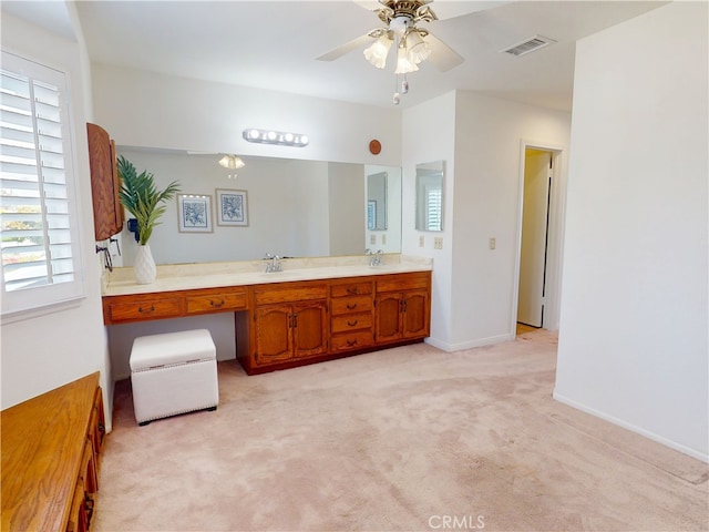 10531 Angel Ave, Fountain Valley, CA 92708 - bathroom featuring double vanity, ceiling fan, and baseboards
