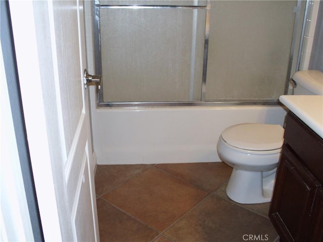 1110 Laurelhurst, San Jacinto, CA 92582 - bathroom with vanity, toilet, tile patterned floors, and shower / bath combination with glass door