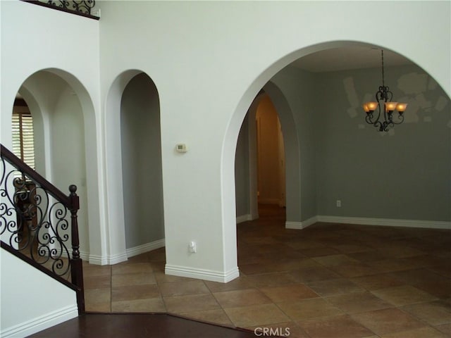 1110 Laurelhurst, San Jacinto, CA 92582 - empty room with a chandelier and baseboards