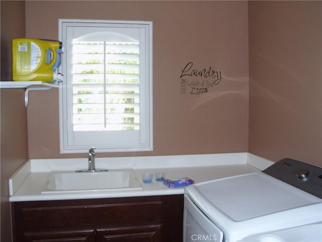 1110 Laurelhurst, San Jacinto, CA 92582 - laundry area featuring washer / clothes dryer and cabinet space