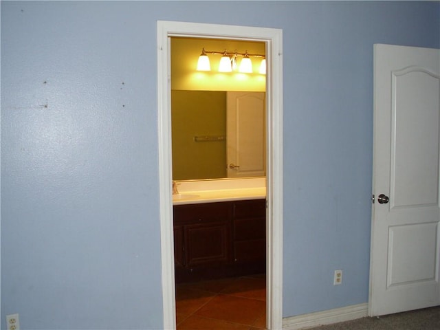 1110 Laurelhurst, San Jacinto, CA 92582 - hallway with baseboards and a sink