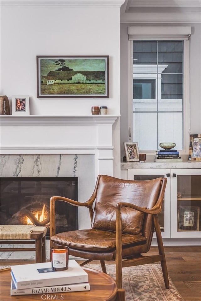 717 35th St, Manhattan Beach, CA 90266 - sitting room featuring wood finished floors, a high end fireplace, and crown molding