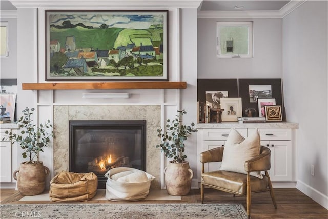 717 35th St, Manhattan Beach, CA 90266 - living area with ornamental molding, wood finished floors, baseboards, and a fireplace