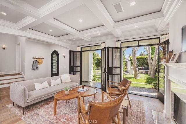 717 35th St, Manhattan Beach, CA 90266 - living area with arched walkways, wood finished floors, coffered ceiling, beam ceiling, and ornamental molding