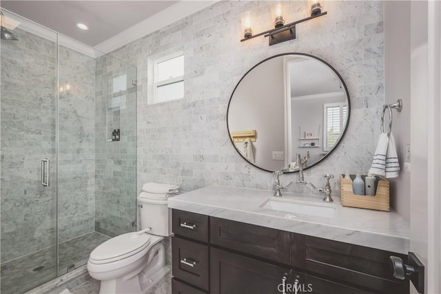 717 35th St, Manhattan Beach, CA 90266 - full bathroom with tile walls, ornamental molding, healthy amount of natural light, a stall shower, and toilet