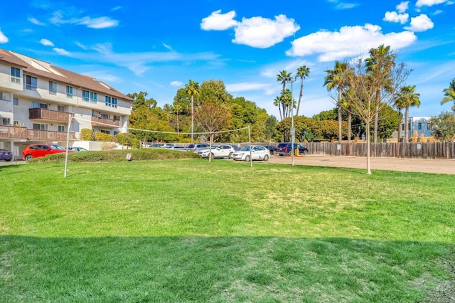 view of yard featuring volleyball court