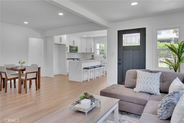 1925 N Marengo Ave, Pasadena, CA 91103 - living area featuring light wood-type flooring, recessed lighting, and beam ceiling