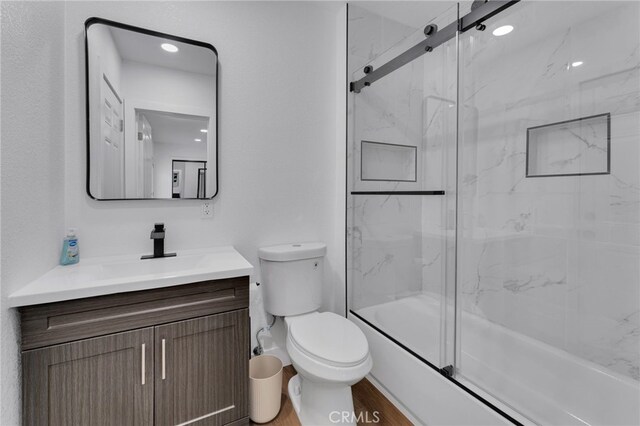 1925 N Marengo Ave, Pasadena, CA 91103 - full bathroom featuring toilet, vanity, and wood finished floors