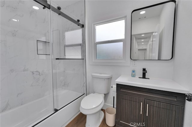 1925 N Marengo Ave, Pasadena, CA 91103 - bathroom with toilet, vanity, wood finished floors, and baseboards