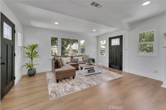 1925 N Marengo Ave, Pasadena, CA 91103 - living area featuring healthy amount of natural light, light wood finished floors, baseboards, and recessed lighting
