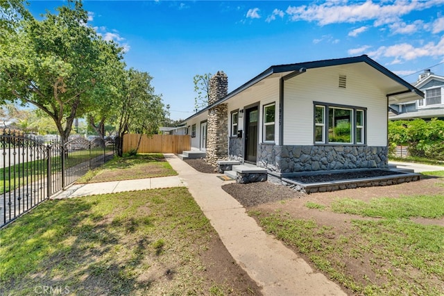 1925 N Marengo Ave, Pasadena, CA 91103 - view of front of home with stone siding and a chimney