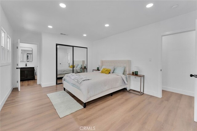 1925 N Marengo Ave, Pasadena, CA 91103 - bedroom featuring light wood-style flooring, recessed lighting, baseboards, and a closet