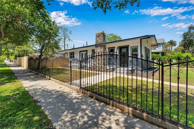 1925 N Marengo Ave, Pasadena, CA 91103 - view of front of house with french doors and a chimney