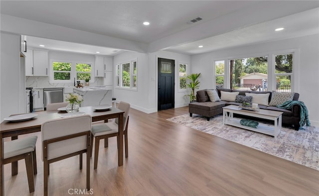 1925 N Marengo Ave, Pasadena, CA 91103 - living room with light wood-type flooring, baseboards, and recessed lighting