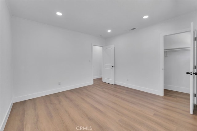 1925 N Marengo Ave, Pasadena, CA 91103 - unfurnished bedroom featuring recessed lighting, wood finished floors, baseboards, a spacious closet, and a closet