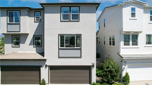 612 Prickly Pear Way, Rancho Mission Viejo, CA 92694 - view of front facade featuring a garage, stucco siding, and driveway
