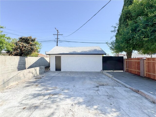 garage featuring fence