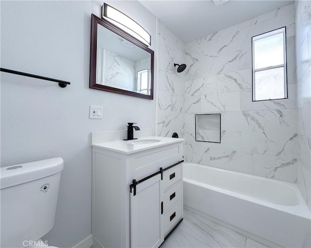 full bath with shower / tub combination, vanity, toilet, and marble look tile flooring