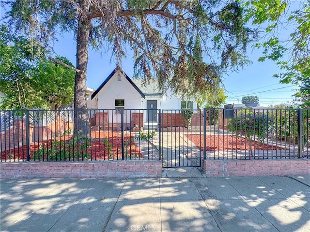 gate featuring a fenced front yard