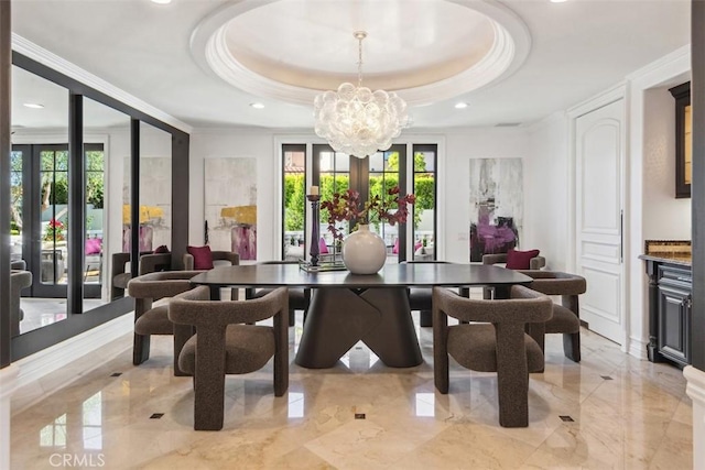 28 Shoreridge, Newport Coast, CA 92657 - dining space featuring healthy amount of natural light, a chandelier, light marble finish floors, ornamental molding, and a tray ceiling